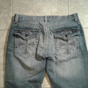 jeans with cross on back pocket